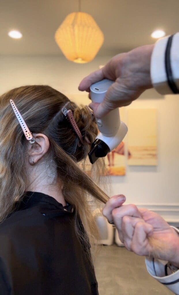 Airtouch vs. Teasy lights -highlighting techniques on brunette hair showing soft blended color and dimensional ribbons